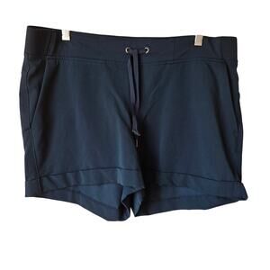 Athleta Midtown 4" shorts in navy blue with a drawstring Size 16